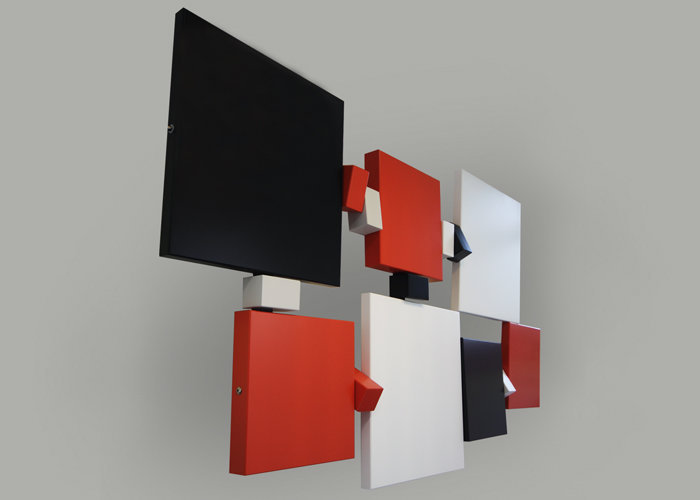 sculpture murale graphique animée horizontale orange noir Pas-Pied-Peint Mobilier Les Pieds Sur La Table réalisation bureaux